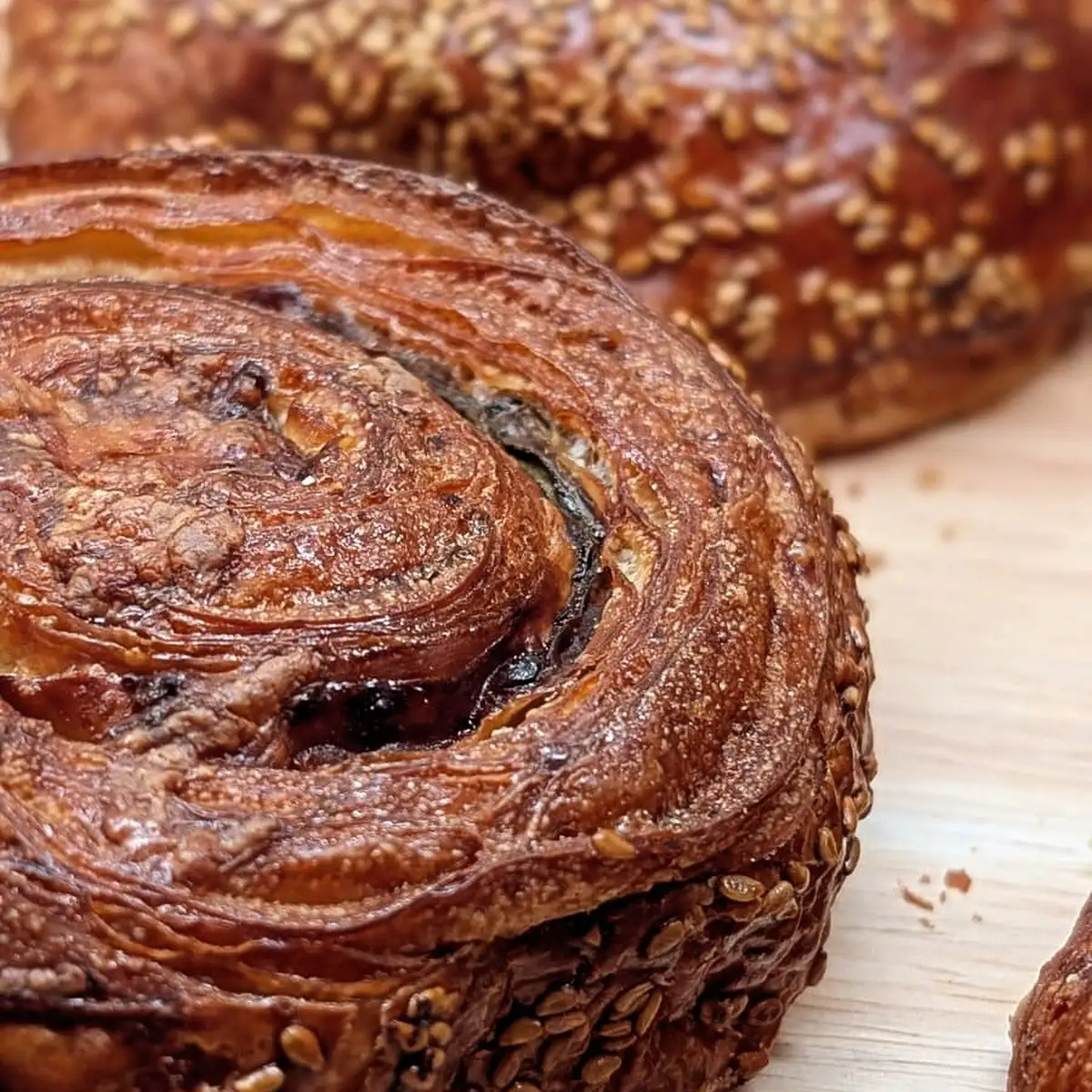 A sesame and chocolate pastry, close up.