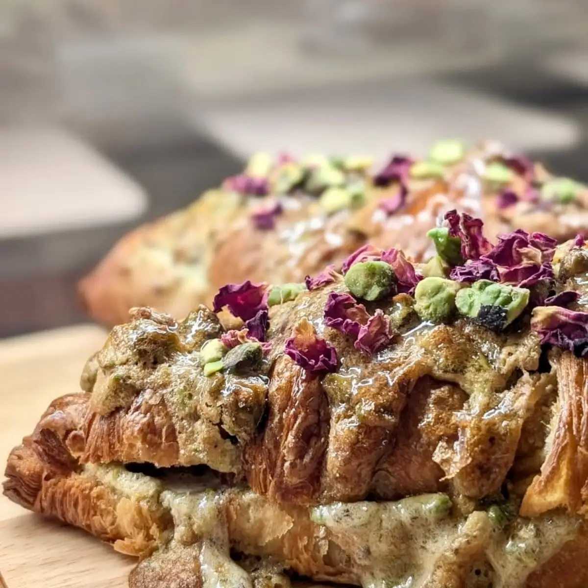 A pistachio and rose danish.